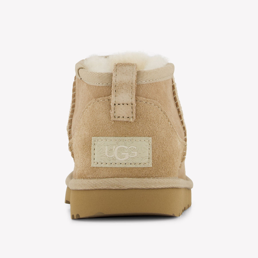 UGG Ultra mini Unisex Botas en Arena